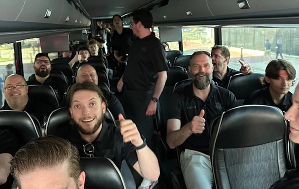 Employees on a Shuttle Bus